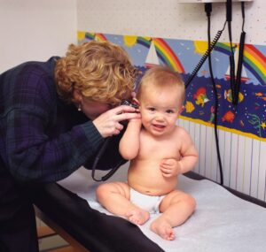 Audiology ear treatment for pediatric patient